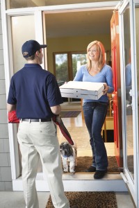 With patience and practice dogs can learn to calmly greet guests to your home!