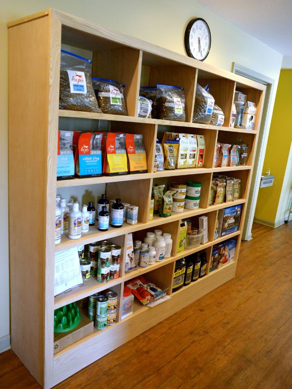 A wooden shelf displaying a food supliment